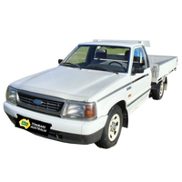 White pickup truck with a flatbed on a white background
