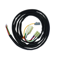 A coiled wiring harness with multiple colored wires connected to a plug.