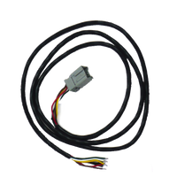 A black wiring harness with a connector for a Honda CR-V SUV.