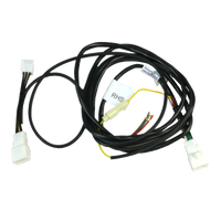 A direct fit wiring harness for a Toyota HiAce Van, featuring various connectors and wiring bundled together.