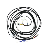 A coiled black wiring harness with white connectors.