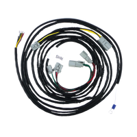 A coiled wiring harness with various colored connectors, designed for use in a Mazda 3 BL Sedan.