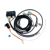 A direct fit wiring harness for a Mazda CX-5 SUV, including various cables and connectors.
