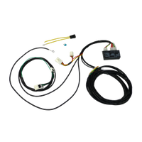 A wiring harness for a Nissan X-Trail T32 SUV, featuring various cables and connectors.